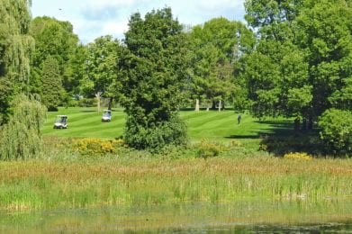 River Course Golfers Playing Course